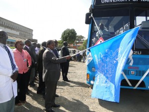 Deputy VC flags off the bus